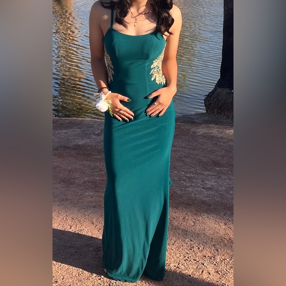 Emerald green prom dress with cutout and train size 2